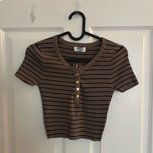 Brown and black striped baby tee with gold buttons